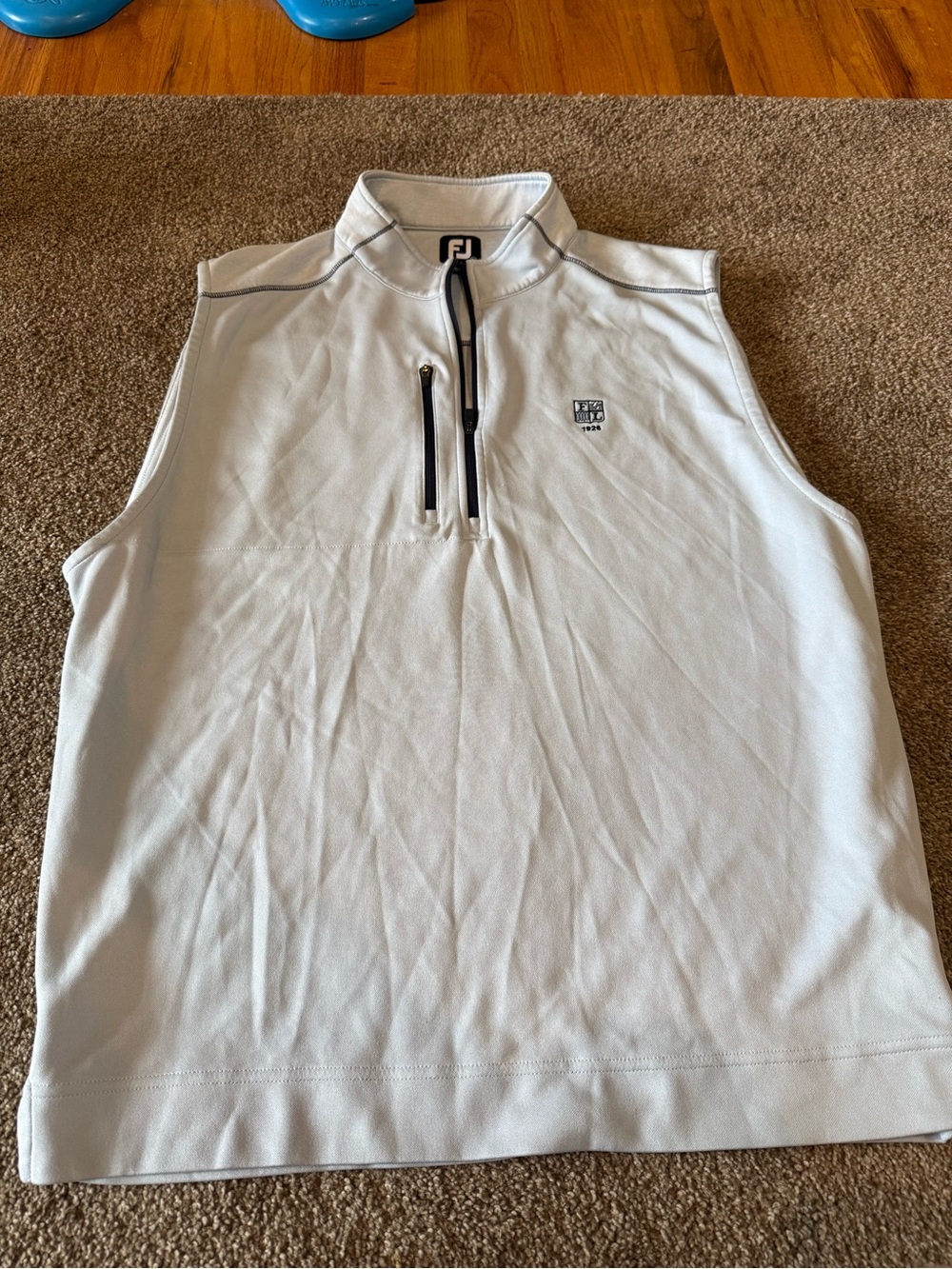 FootJoy White Sleeveless Golf Vest with Black Trim and Zip Chest Pocket
